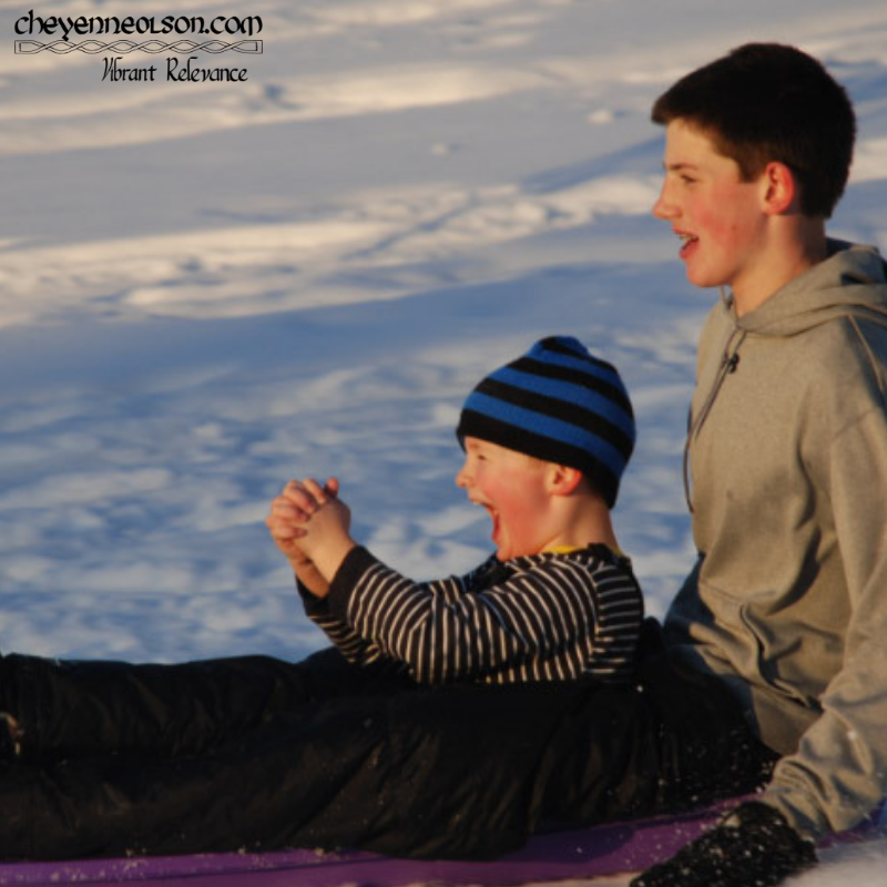 Camron and Drew sledding